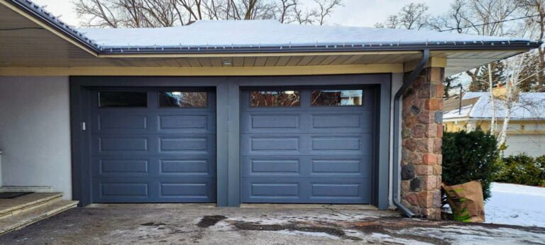 2 new garage doors replaced and installed