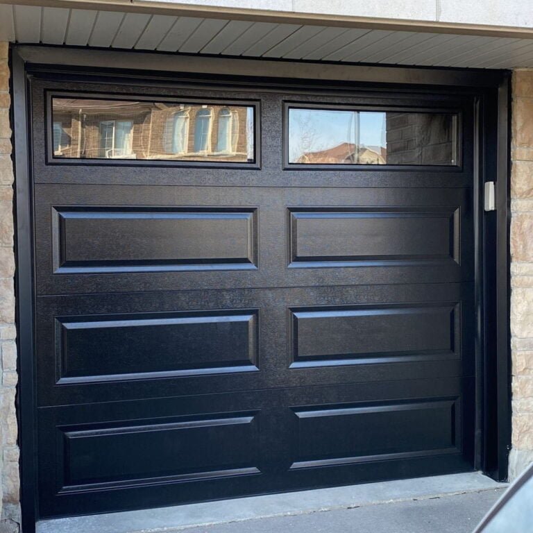 black garagfe door with 2 glass windows