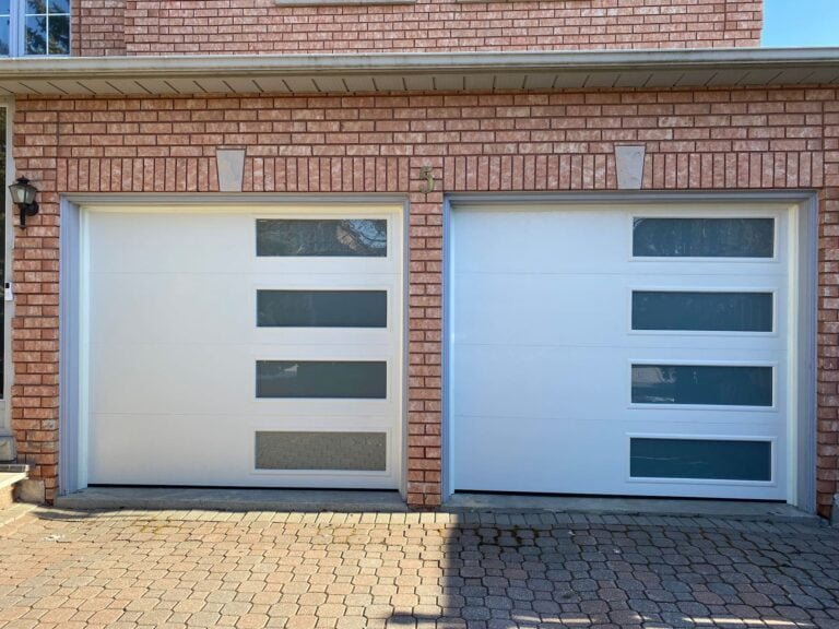 double white garage door with glass inserts